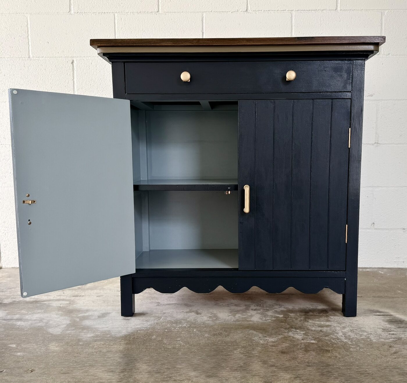 Midnight Walnut cabinet open to show its finished interior